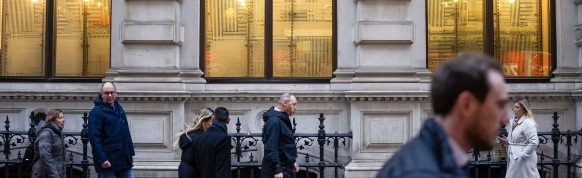Chinese family signing mortgage papers in the UK